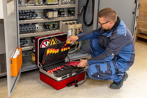 High-voltage tool box with 52 insulated tools for industrial applications